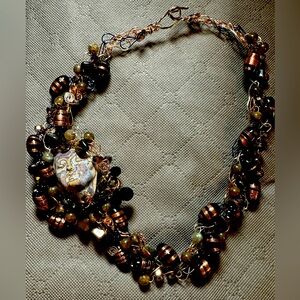 Beautiful 3 wire blue/silver/copper colored crocheted statement necklace